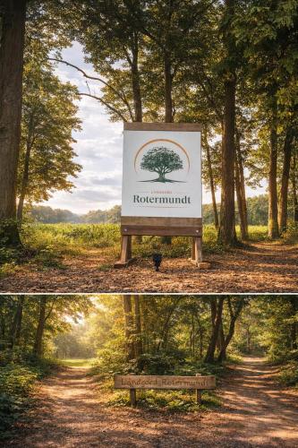 a sign in the middle of a road with a tree at Landgoed Rotermundt in Huijbergen