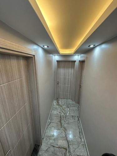 a room with a hallway with a ceiling at Tree Rose Suite in Uzungöl