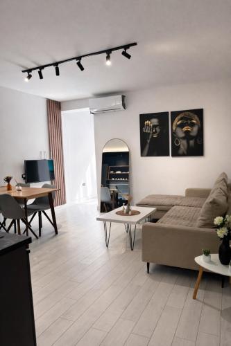 TV tai viihdekeskus majoituspaikassa Apartment OG