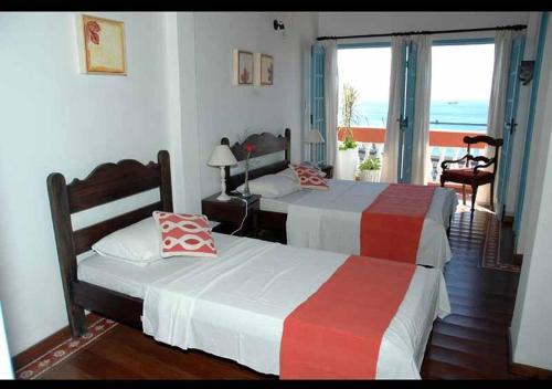 Postel nebo postele na pokoji v ubytování Bed & breakfast Villa Carmo