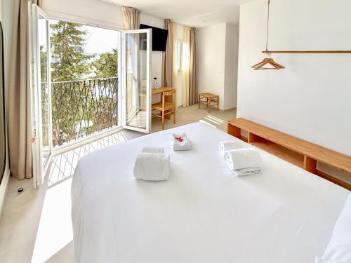 En eller flere senge i et værelse på Hotel Boutique Máram - Adults Recommended