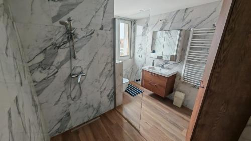 a bathroom with a shower and a sink at Willa 2 piętro in Szczecinek
