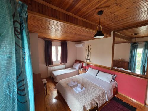 a bedroom with a bed and a couch at Cosy apartment in Sparta in Sparta