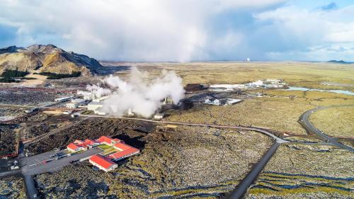 an aerial view of a steam train on tracks at Northern Light Inn in Grindavík