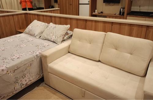 a couch sitting in the back of a boat at Flat na Praia dos Carneiros - Resort Max Carneiros Suítes in Tamandaré