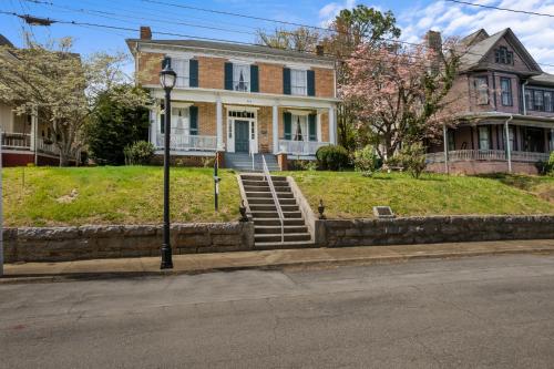 a house with stairs in front of it at Historic Home with Southern Charm in Bristol