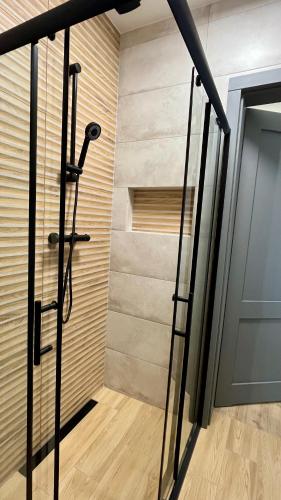 a room with a closet with a door and a staircase at Pokoje nad Jeziorem Solina in Solina