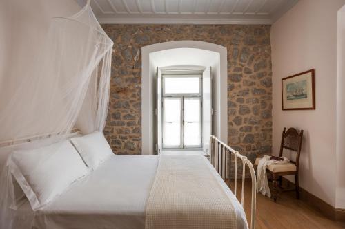 Llit o llits en una habitació de Allegra Heritage Mansion