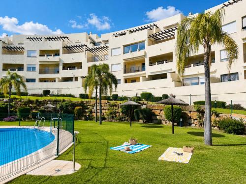 Benalmadena Spacious Apartment with Private Garden Pool and BBQ - Magnolia Properties
