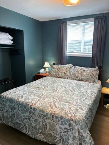a bedroom with a bed and a window at The Gateway Suite in Fortune