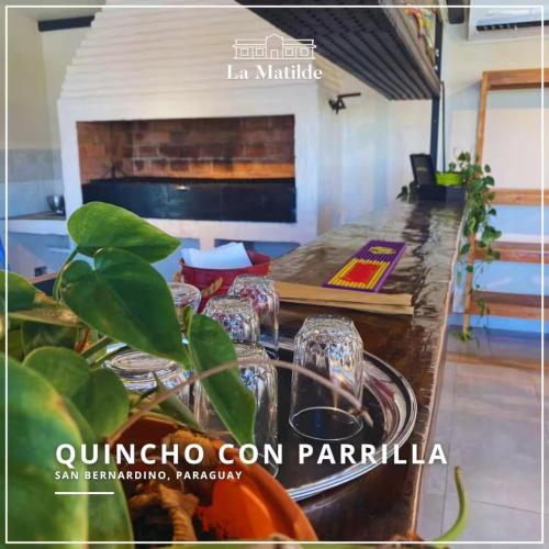 a magazine cover of a kitchen with a counter top at La Matilde Lodge in San Bernardino