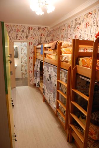 Postel nebo postele na pokoji v ubytování Green Apple Hostel