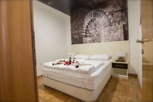 Ένα ή περισσότερα κρεβάτια σε δωμάτιο στο Luxury Apartments Taša