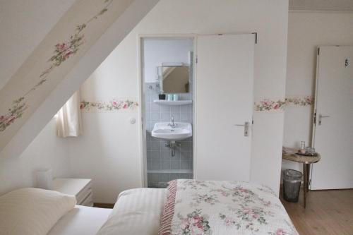 Posteľ alebo postele v izbe v ubytovaní Orchidee Altenau