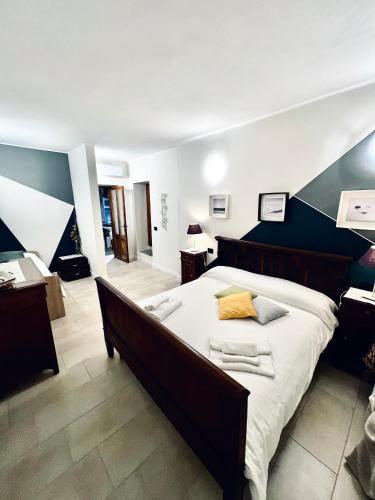 a bedroom with a large bed in a room at Cascina Canale in Sabbio Chiese