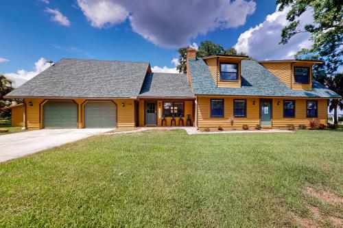 a large wooden house with a garage at 3424 Indian River Dr Main in Cocoa