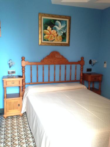 Кровать или кровати в номере Hostal Aranda