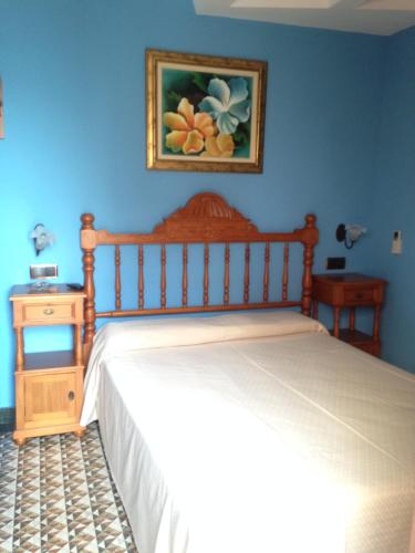 Postel nebo postele na pokoji v ubytování Hostal Aranda