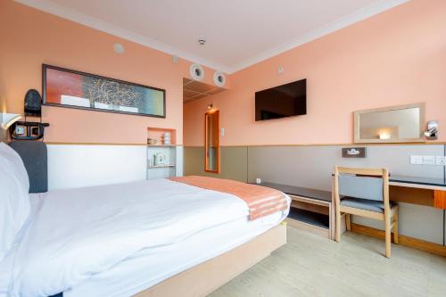 Postel nebo postele na pokoji v ubytování Eurotraveller Hotel - Premier - Harrow