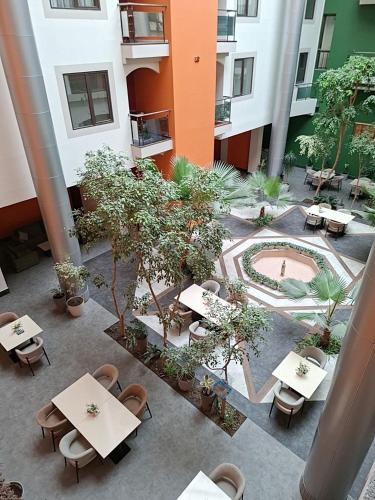 an overhead view of a courtyard with tables and trees at Ararat Hotel in Yerevan