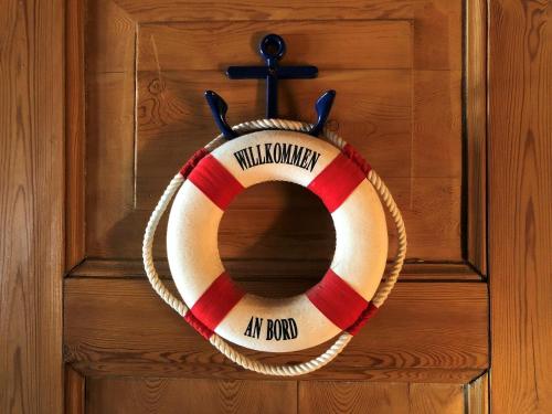 a wreath is hanging on a door at Ferienhaus Deubel Escobar in Kappeln