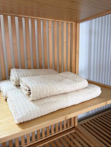a bed in a sauna with two towels at Sanmarcos 2 in Adeje