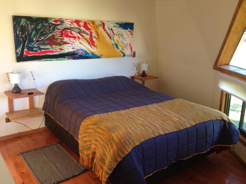 Katil atau katil-katil dalam bilik di Tierra de Domos