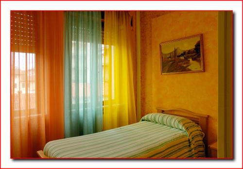 A bed or beds in a room at Hotel Ristorante Fratelli Zenari