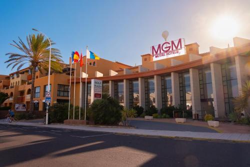 a hotel on a street in front of a building at Grand Muthu Golf Plaza Hotel & Spa in San Miguel de Abona