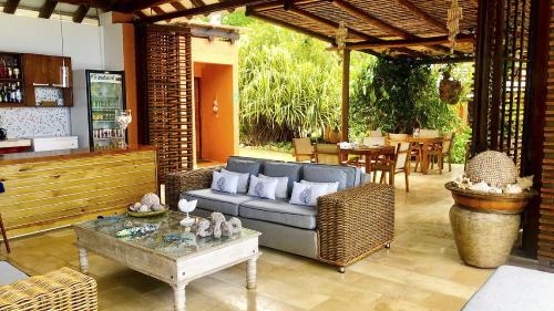 a living room with a couch and a table at Hotel Acantilado de La Tierra by On vacation in San Andrés