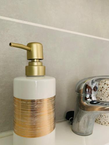 a spray bottle sitting on top of a kitchen counter at The Bridge at Montego in Fourways