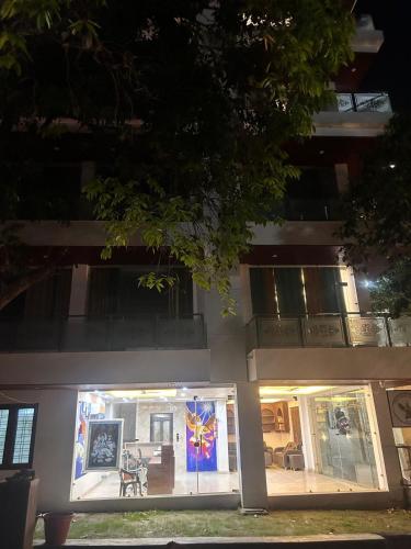 a building with a painting on the side of it at The great Garuda hotel in Rishīkesh