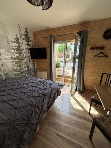 Llit o llits en una habitació de Maison Vaniméou