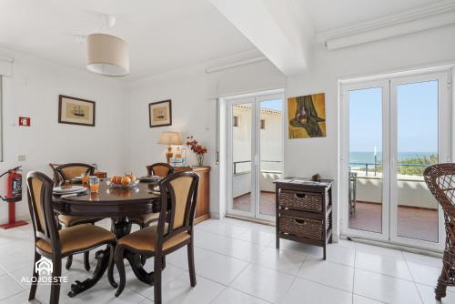 a dining room with a table and chairs at BC Beach House - Santa Cruz in Santa Cruz