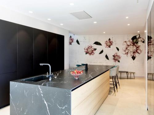 a kitchen with a sink and a counter top at Lux CostaBravaSi in Platja d'Aro