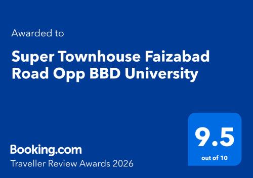 a blue sign that reads super townhome fahan road app bbb university at Townhouse Faizabad Road Opp BBD University in Lucknow