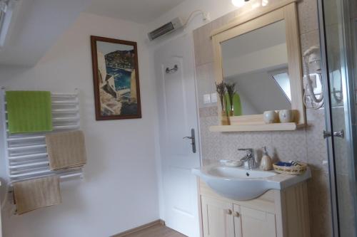 Koupelna v ubytování Tündérgyöngye Apartmanház