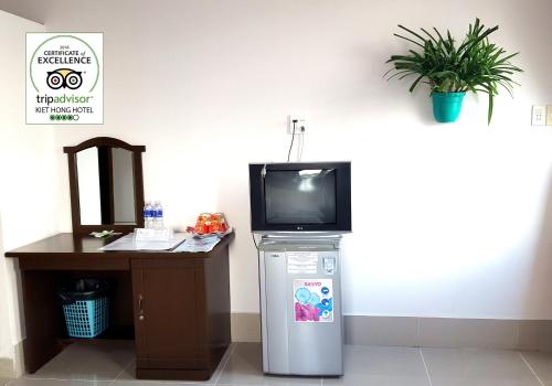 Kiet Hong Hotelにあるテレビまたはエンターテインメントセンター