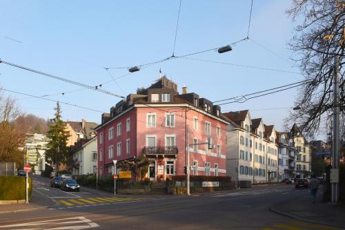 a building on a city street with at Swiss Star California - Self Check-In in Zürich