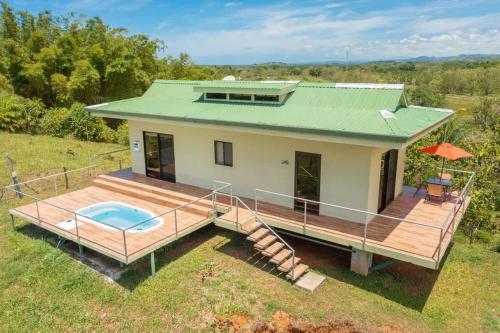 an overhead view of a house with a deck at Villa Kiskadee - Beautiful Mountain Views with Private Pool in Quepos