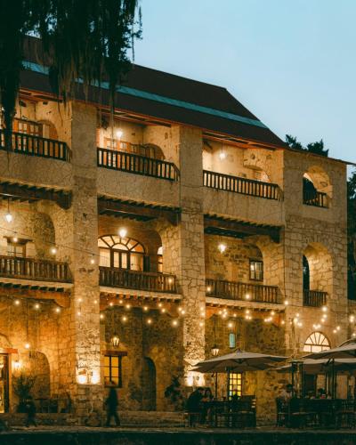 a large stone building with lights on it at Hacienda Santa Maria Regla in Huasca de Ocampo