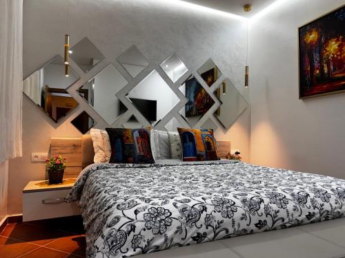 a bedroom with a large bed in a room at Mirador Capo Negro in Cabo Negro