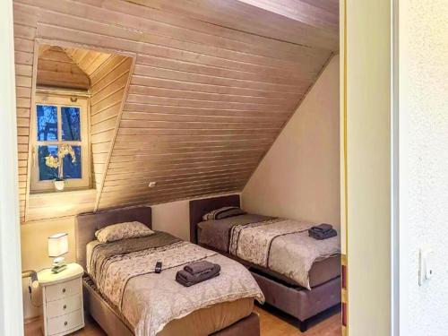 Gemütliche Wohnung in Konz an der Mosel tesisinde bir odada yatak veya yataklar