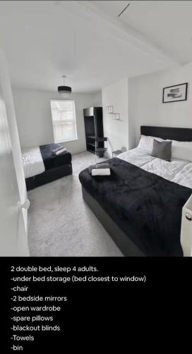 a bedroom with a large bed and a couch at Medway Hidden Gem in Gillingham