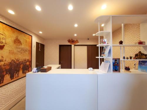 a room with a large painting on the wall at モンゴリアンテーマパークジャパン in Kamigō