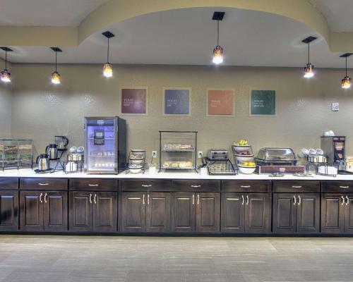 a kitchen with a counter with many items on it at Comfort Inn & Suites Fort Worth West I-30 NAS JRB in Fort Worth