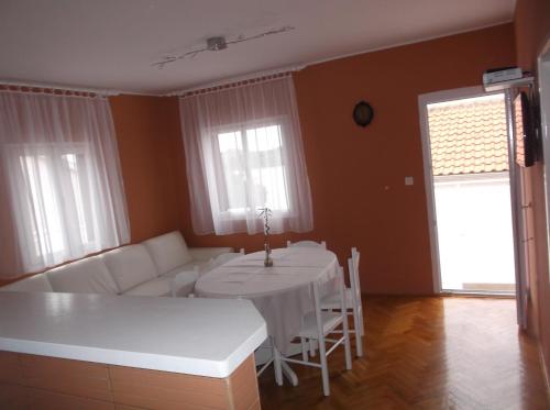 Postel nebo postele na pokoji v ubytování Apartman Vladić