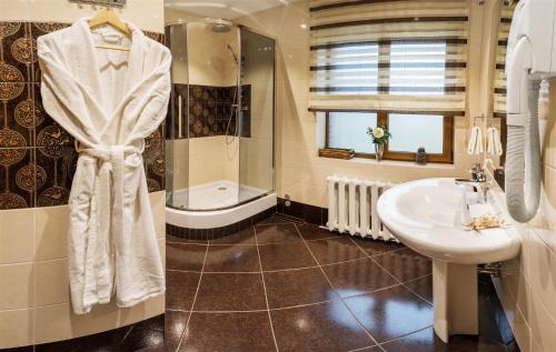 Koupelna v ubytování Hutor Hotel