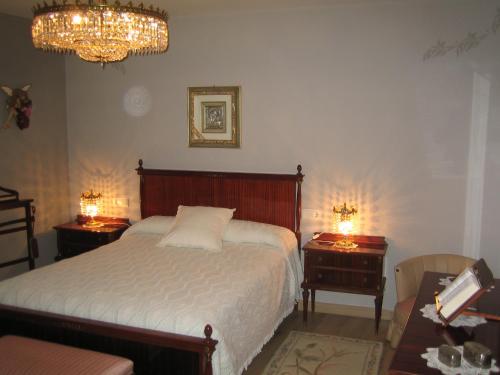 מיטה או מיטות בחדר ב-Casa Constanza