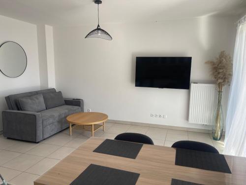 Appartement cosy avec garage et terrasse près de la mer